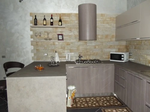 Cucine moderne effetto pietra ~ canlic for . Rivestimento cucina effetto muretto