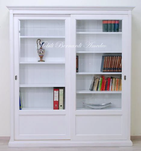 Libreria bianca con 2 ante scorrevoli : (Ros?) Libreria bianca con 2 ante scorrevoli : (Ros?)